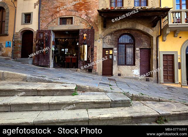 Stone stairs in front of old patrician houses in Arezzo Toscana