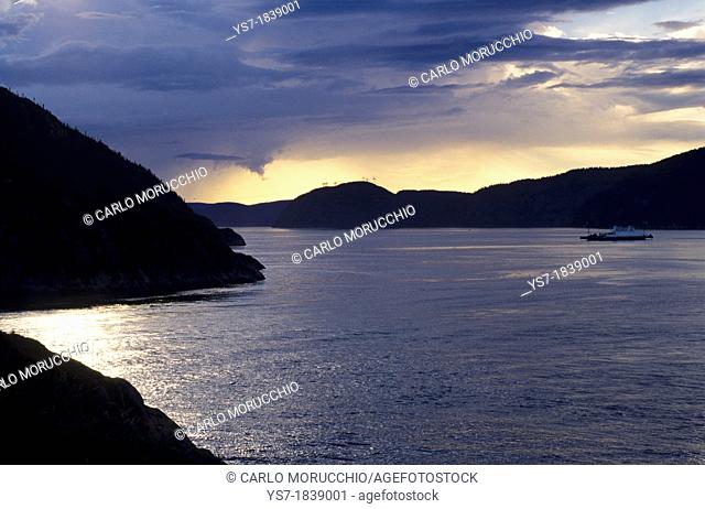 Saguenay fjord at sunset and the ferry to Tadoussac, Quebec, Canada, North America