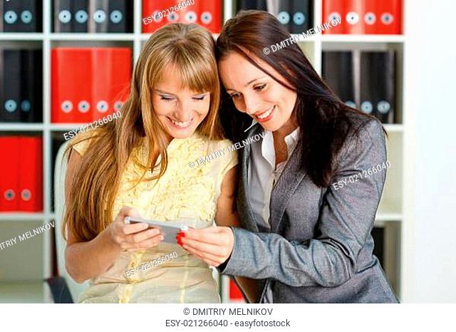 Business women with mobile phone