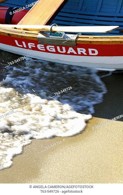 lifeboat along shore of beach