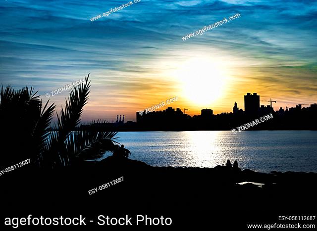 Cityscape coastal sunset scene at Montevideo city, Uruguay