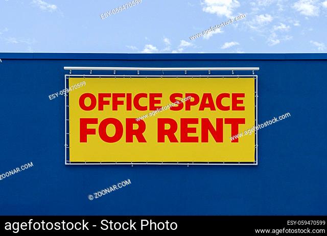 Office space for rent written on a billboard