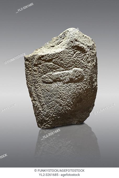 Late European Neolithic prehistoric Menhir standing stone with carvings on its face side. The representation of a stylalised male figure with the remains of a...