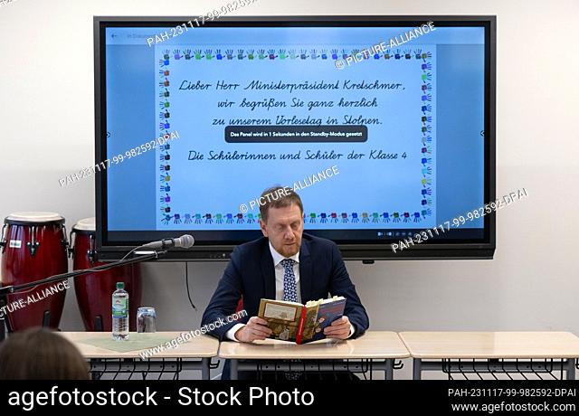 17 November 2023, Saxony, Stolpen: Michael Kretschmer (CDU), Minister President of Saxony, reads from the book ""Mein Freund Otto