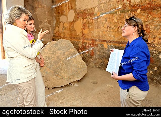 Queen Mathilde of Belgium and Crown Princess Elisabeth pictured in conversation with a guide during a visit to of the excavation site of Dayr-al-Barsha on the...