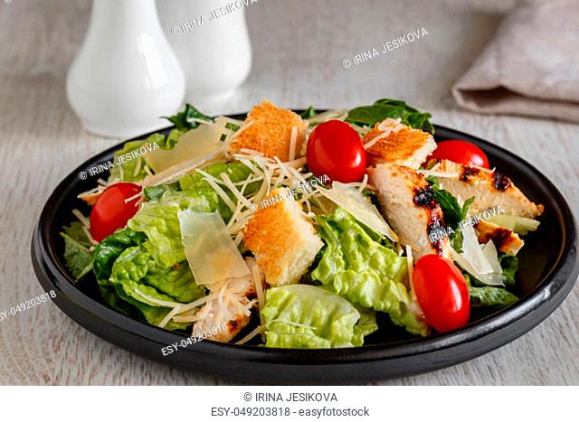 Caesar salad with chicken and tomatoes, Roman salad