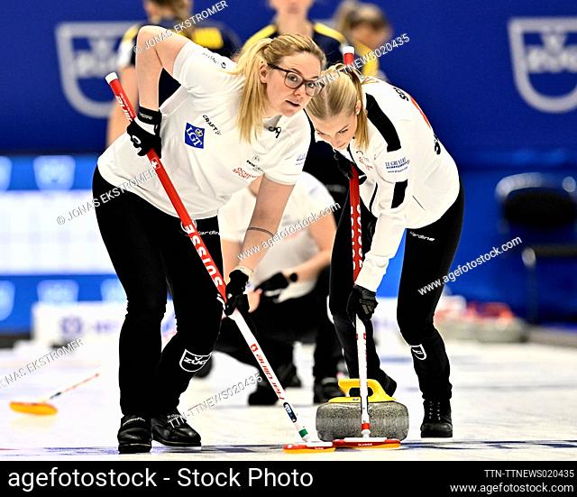 Switzerland's Alina Paetz (L) and Briar Schwaller-Huerlimann in action during the match between Sweden and Switzerland during the round robin session 3 of the...