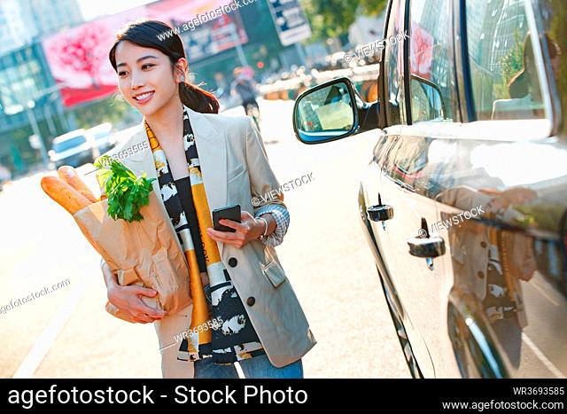 After shopping young woman
