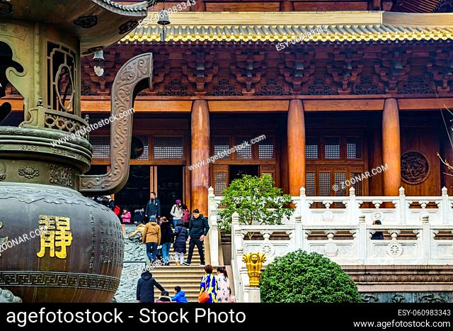 SHANGHAI, CHINA, JANUARY - 2019 - People at jingan buddhist temple at shanghai city, china