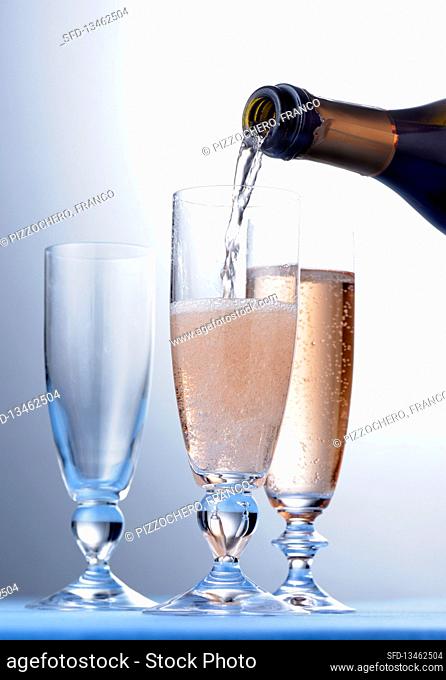 Pouring glasses of Champagne
