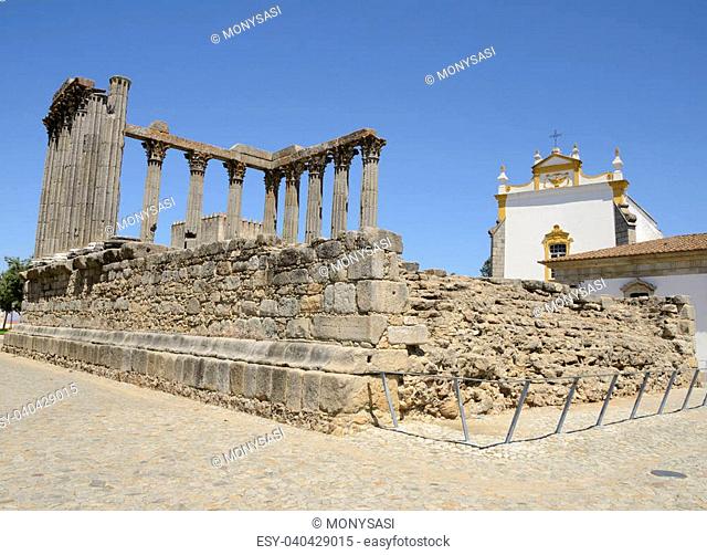 Roman ruins in a square located in the historical center of Evora, Portugal