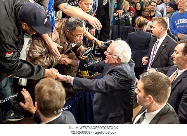 Dearborn, Michigan - Surrounded by Secret Service agents, presidential candidate Bernie Sanders shakes hands after speaking to members of the United Auto...