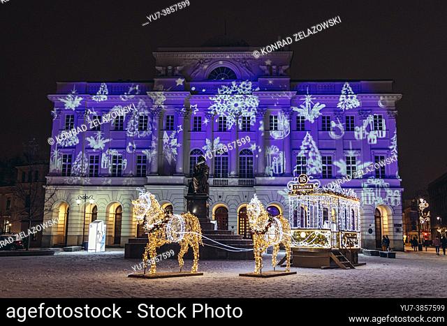Christmas decorations in front of Staszic Palace and Nicolaus Copernicus monument in Warsaw city, Poland