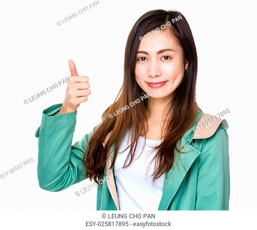 Woman hold with thumb up