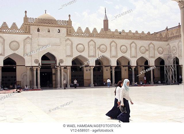 Two school  Girls walking inside Al-azhar Mosque in Cairo, Egypt
