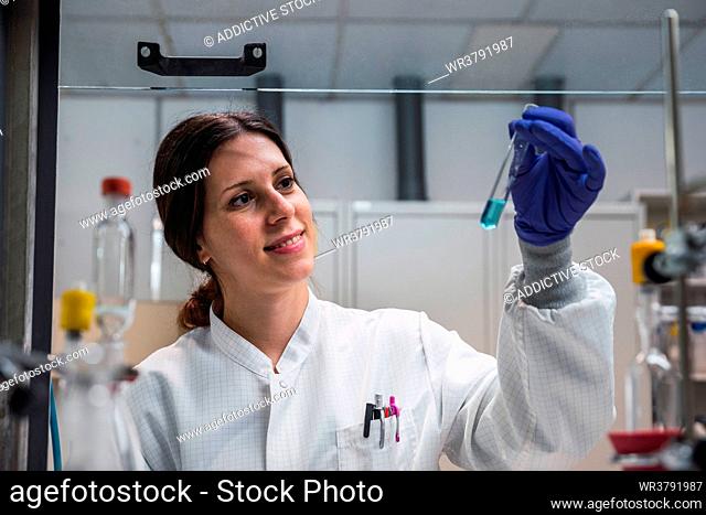 smiling, test tube, biochemistry, scientist