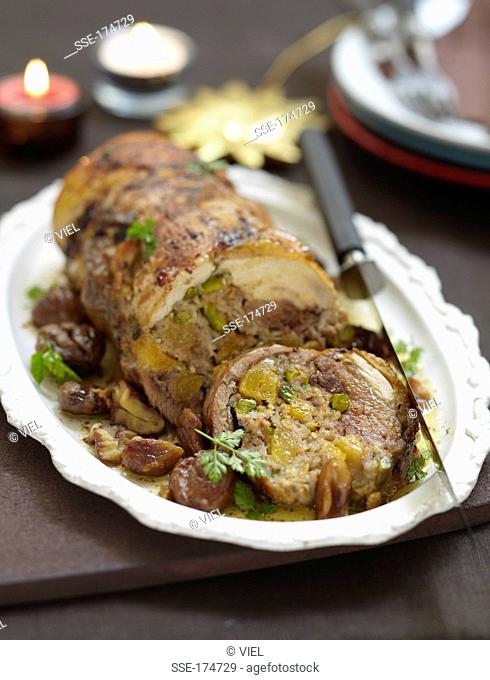 Guinea-fowl roast stuffed with dried apricots and pistachios
