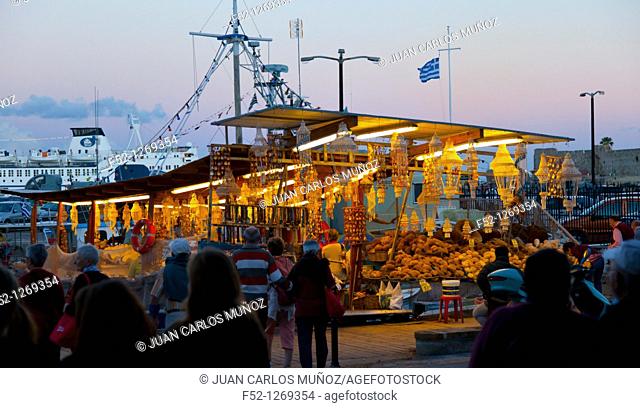 Souvenir shops and seafood at the commercial port, City of Rhodes, Rhodes Island, Dodecanese, Greece, Mediterranean Sea