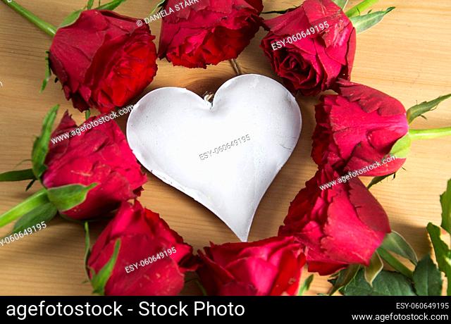 nice background with roses and a white heart