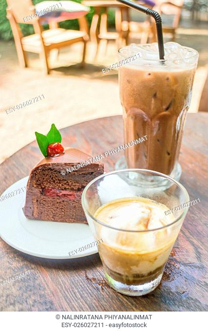 Coffee drinks and black forest cake, stock photo