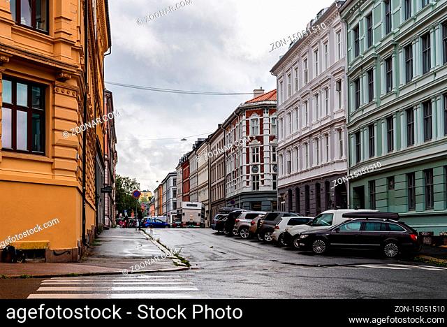Oslo, Norway - August 11, 2019: View of street in Grunerlokka, a trendy hipster neighborhood in central Oslo. Summer rain