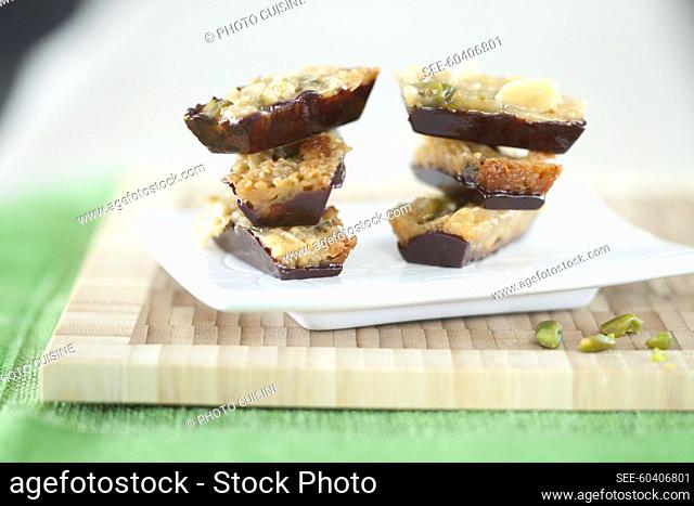 Candied fruit cereal bars un dark chocolate casings