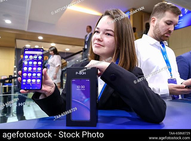 RUSSIA, MOSCOW - DECEMBER 18, 2023: The official presentation of the Russian smartphone R-Phone and the Rosa Mobile operating system at the media centre of the...