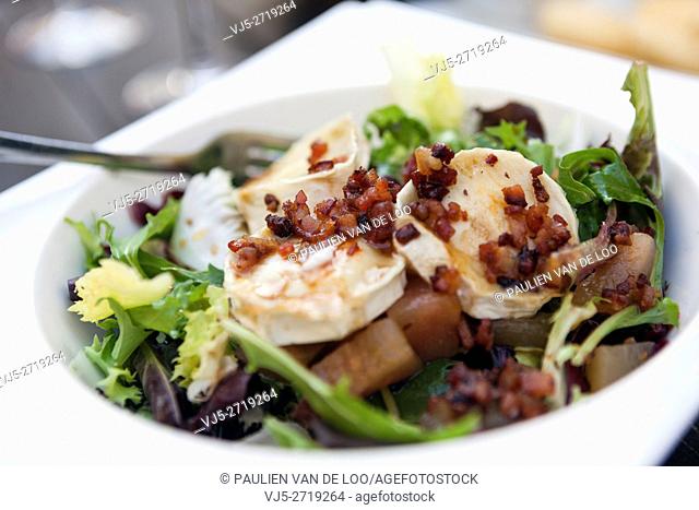 Sevilla, Spain, delicious goat cheese salad with honey