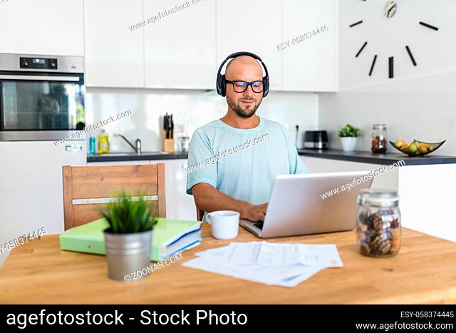 Man working from home during the coronavirus Covid 19 pandemic