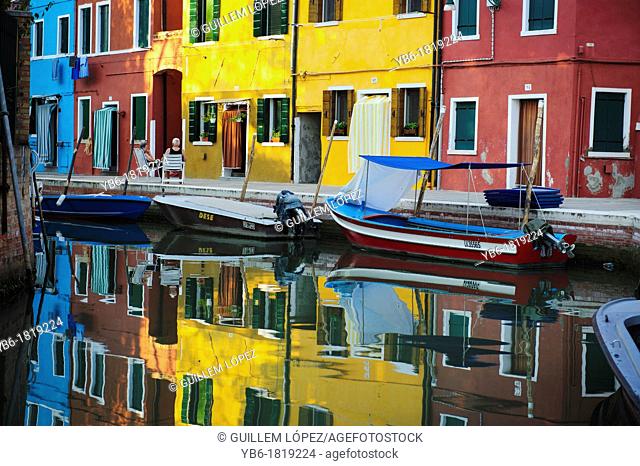 Colorful Houses and reflections in Burano, Venice, Italy