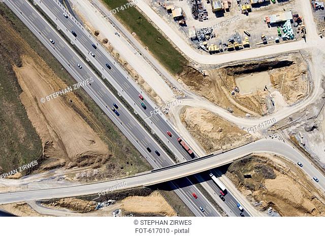 Aerial view of a construction site and motorway