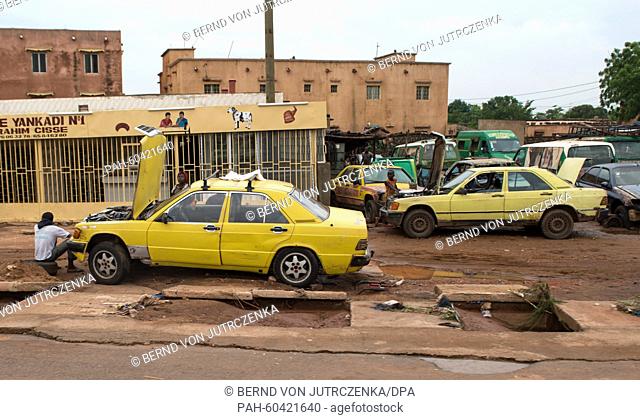Old Mercedes cars stand on a street in Bamako, Mali, 28 July 2015. Mercedes limousines can be seen everywhere on the streets of Bamako