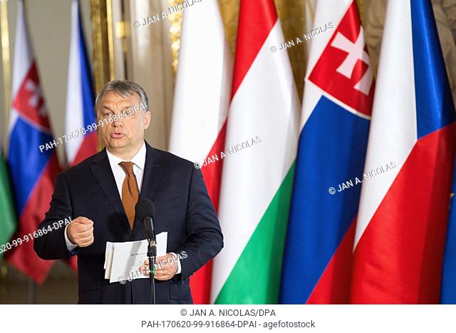 Hungarian Prime Minister Viktor Orban receives the presidency of the Visegrad Group to Hungary, during a ceremony at the Royal Castle in Warsaw, Poland, Monday