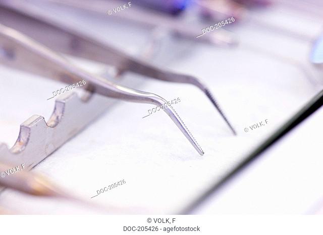 dental instrument , pair of tweezers