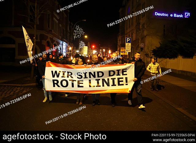 15 January 2022, Thuringia, Greiz: ""We are the Red Line"" is written on a poster of participants of a demonstration against the Corona measures in the city...