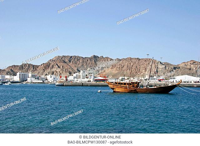 Oman, Dhau in the harbour of courage yard boat and harbour