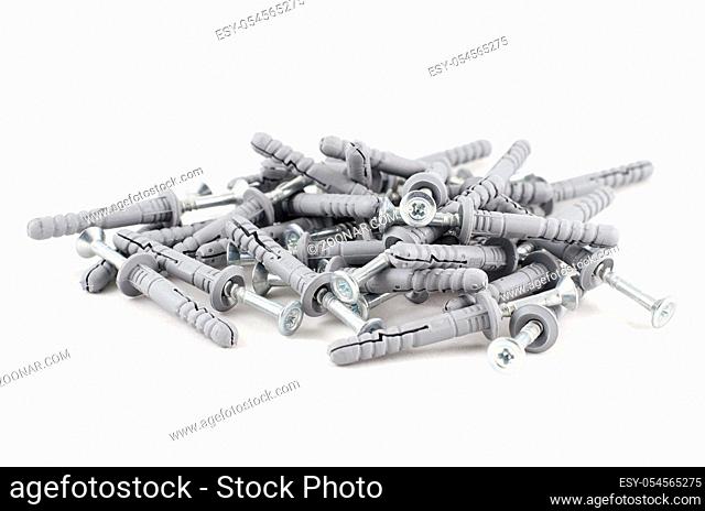 Metallic screws isolated over white background