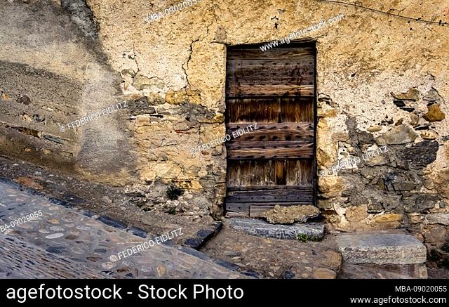 Old wooden door in Roquebrun