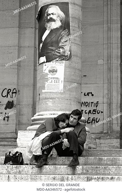 Occupation of the Sorbonne in Paris. Two students are embraced on the stairs at the entrance to the Sorbonne, under a column of the facade