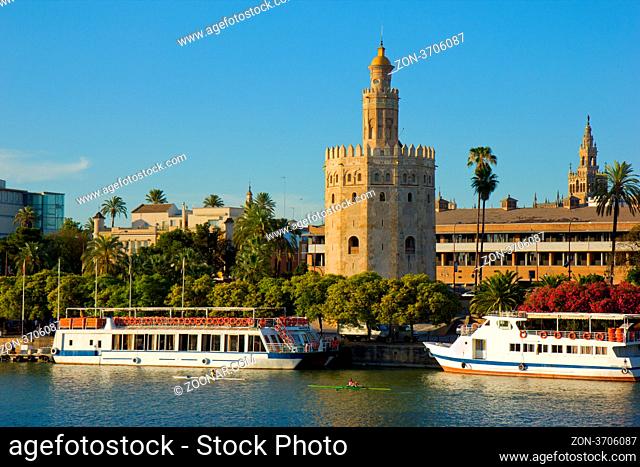cityscape of Seville with Golden Tower (Torre del Oro), Spain