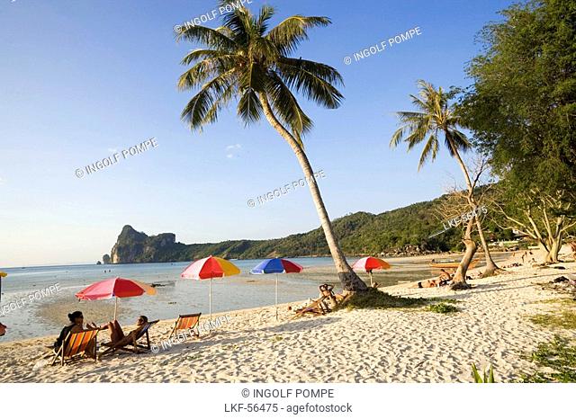 Tourists sunbathing at beach Ao Lo Dalam, Lohdalum Bay, Ko Phi Phi Don, Ko Phi Phi Island, Krabi, Thailand, after the tsunami