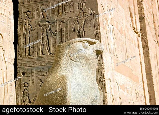 Ancient Egyptian statue of the falcon headed god Horus. Temple of Horus, Edfu, Egypt,
