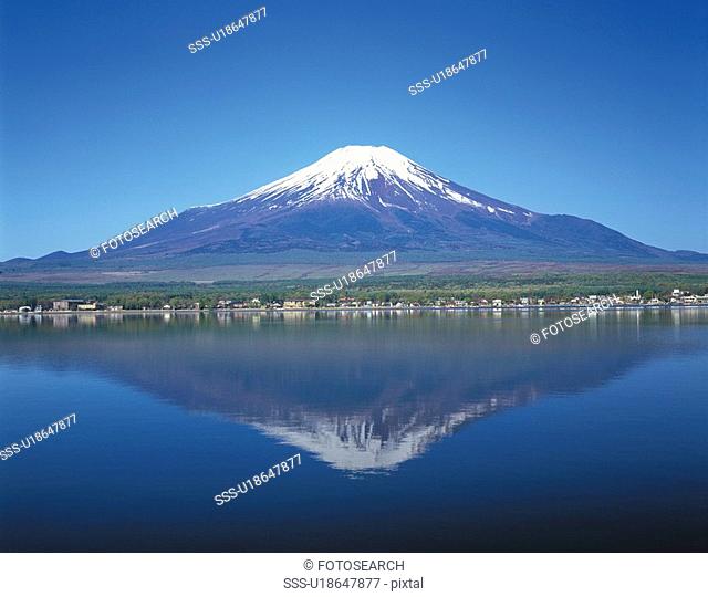 Mt. Fuji reflecting on surface of Lake Yamanaka, Yamanakako village, Yamanashi prefecture, Japan