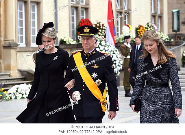04 May 2019, Luxembourg, Luxemburg: Queen Mathilde of Belgium, King Philippe and Crown Princess Elisabeth of Belgium leave the church after the state funeral of...