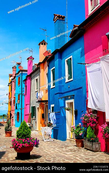 Colorful houses in Burano, Venice, Italy. Burano is an island in the Venetian Lagoon and is known for its lace work and brightly colored homes