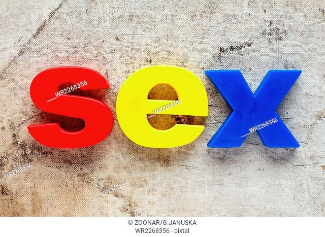 SEX spelled out using colored magnets