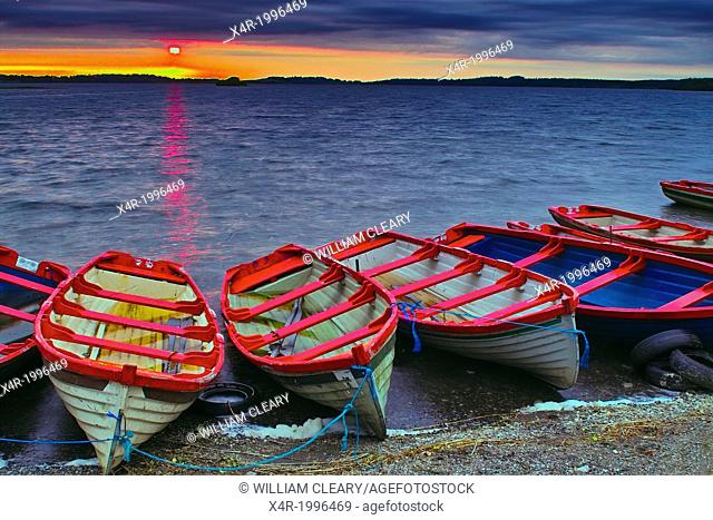 Sunset over Lough Owel, with moored boats in the foreground, near Mullingar, County Westmeath, Ireland