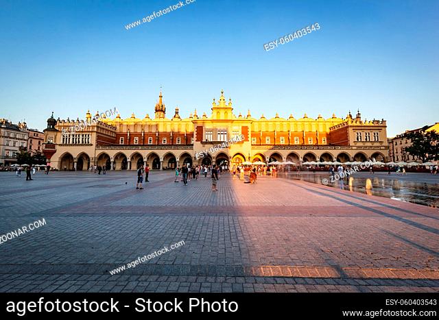 CRACOW, POLAND - June 29, 2016: The Cloth Hall, Polish Sukiennice in sunshine. Old medieval town of Cracow is listed as UNESCO heritage site