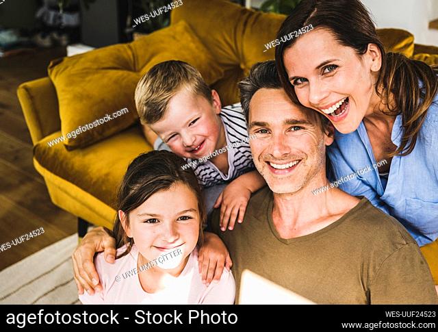 Happy family enjoying leisure time at home