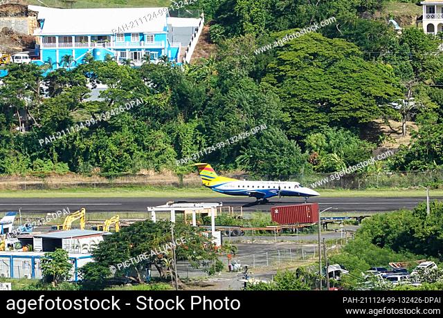01 November 2021, United Kingdom, Castries: An Embraer EMB-120 Brasilia (VQ-TEG) of InterCaribbean Airways takes off in the morning from the airport of the...